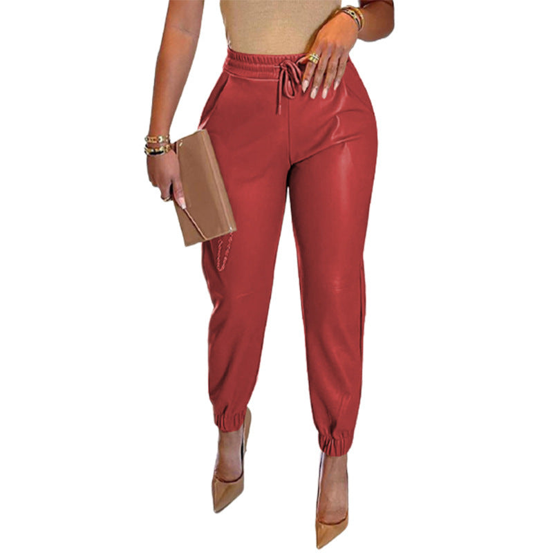 Load image into Gallery viewer, 2022 Spring And Summer European And American Amazon New Solid Color Drawstring Pocket PU Leather Casual Fashion Leggings Leather Trousers Women
